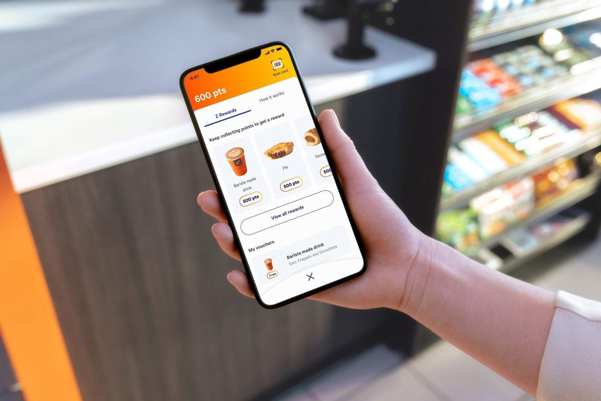 Customer viewing Z App rewards for coffee and food items at convenience store