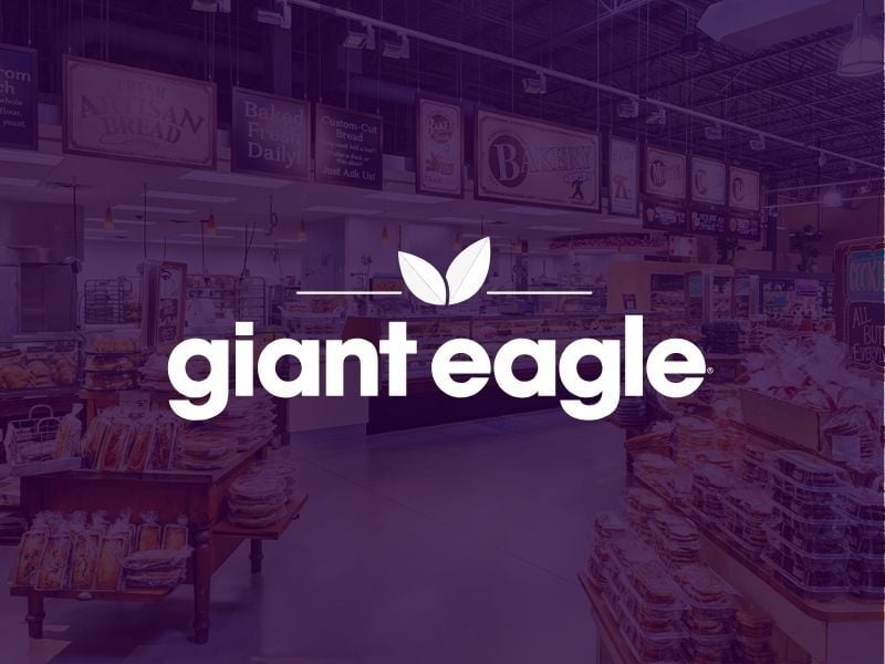 Giant Eagle supermarket bakery section with Giant Eagle logo overlay