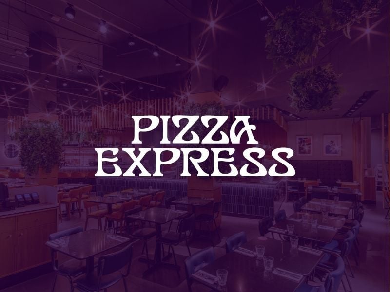 PizzaExpress restaurant interior with brand logo overlayed in white text