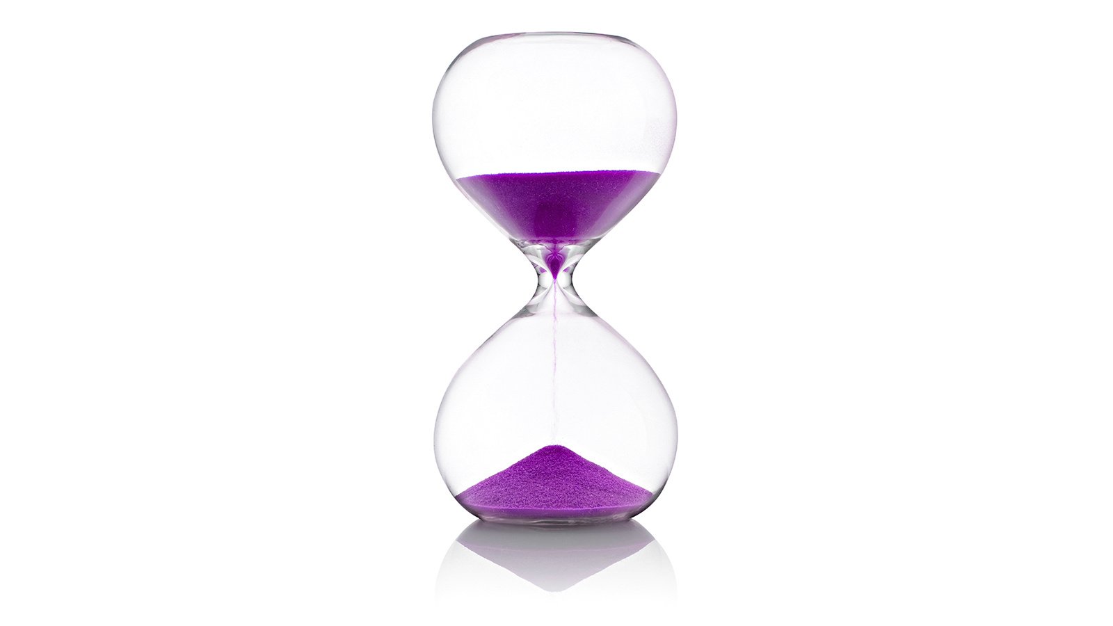 Hourglass with violet sand measuring time against white background