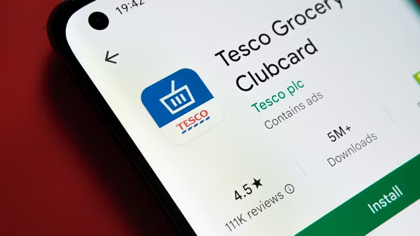 Smartphone screen displaying Tesco Clubcard app