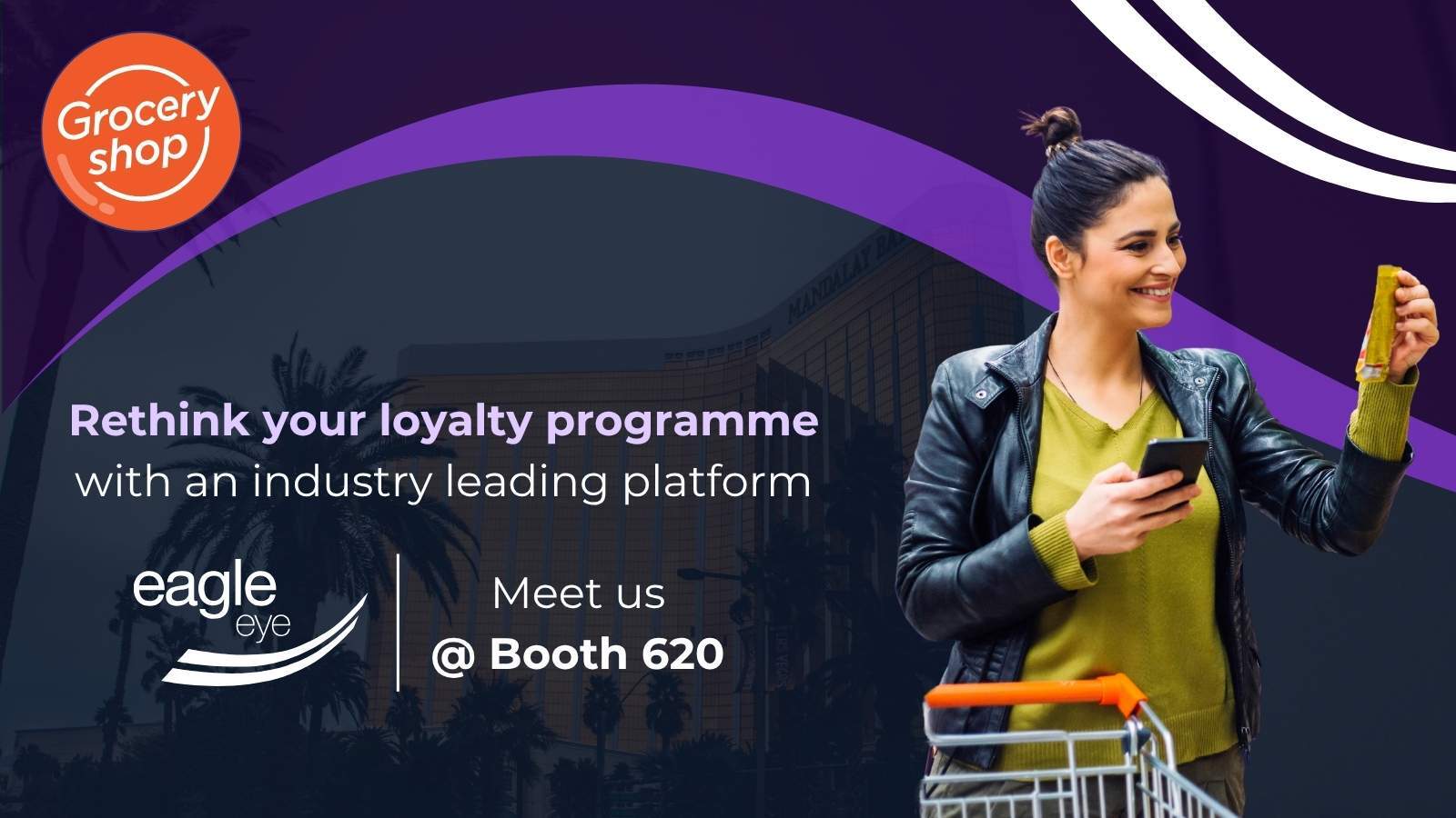 Eagle Eye promotional image, Woman with phone at grocery cart.